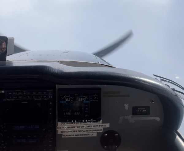 pilot asks a question while flying in his airplane